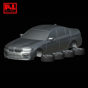 May include: A gray sedan car model with four detached wheels. The car has a detailed front grille, headlights, and side mirrors. The image is set against a black background. The text "P.L. For You" is in the top left corner.
