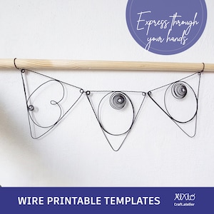 May include: Black wire art banner with three triangular shapes, each featuring a unique wire design. The banner hangs from a wooden dowel. Text at the top reads "Express through your hands." The bottom text says "WIRE PRINTABLE TEMPLATES."