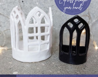 May include: Two pottery templates, one white and one black, with a gothic window design. The white template is on the left, and the black template is on the right. The text "Express through your hands" is in a circle above the templates.