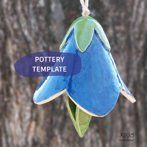 May include: A white ceramic mug with a black handle and the text "But First, Coffee" in a black, bold font. The mug is on a white surface. The mug is approximately 4 inches tall.