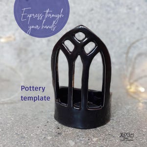 May include: A black pottery template with a gothic arch design. The template has a rectangular base and an arched top with cut-out shapes. Text on the image reads "Express through your hands" and "Pottery template".