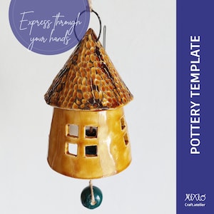 May include: A ceramic house-shaped pottery template with a textured brown roof and a yellow body with square cutouts. The text "Express through your hands" is in a purple circle. A green bead hangs below.