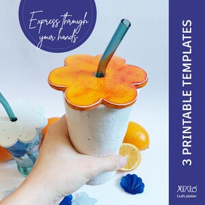 May include: Three printable templates for a flower-shaped lid for a reusable cup with a straw. The lid is orange and the cup is white with black speckles. The text "Express through your hands" is on a blue circle in the background.