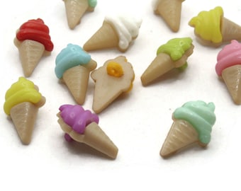 May include: Assortment of colorful ice cream cone buttons. The buttons are made of plastic and feature different colors and designs.
