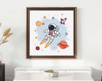 宇宙飛行士のクロスステッチパターン：宇宙をテーマにした刺繍