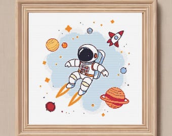 宇宙飛行士のクロスステッチパターン：宇宙をテーマにした刺繍