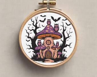 May include: A purple and orange mushroom house with a door and windows.  Five owls are perched on the roof and around the house.  The house is surrounded by trees and bats.