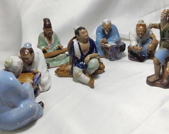 figurines miniatures chinoises Mudmen en céramique vintage du 20ème siècle.