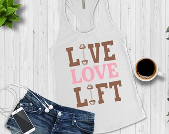 May include: White tank top with the text "LIVE LOVE LIFT" in brown and pink letters. The letters are stacked on top of each other. A dumbbell graphic is next to each word.