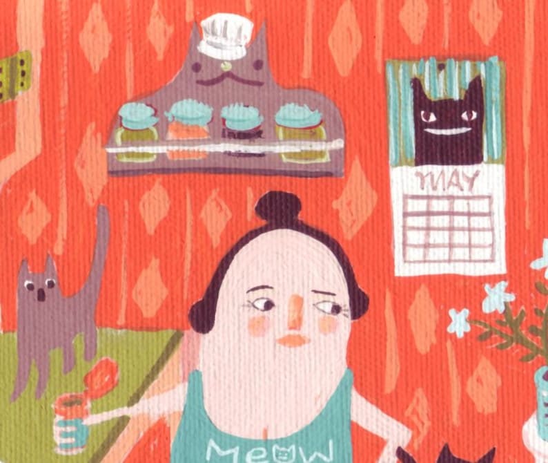 May include: A woman with a bun in her hair is wearing a green shirt with the word "Meow" on it. She is holding a can of cat food and looking at a black cat. There is a calendar on the wall that says "May" and a shelf with jars on it. The background is a red and white pattern.