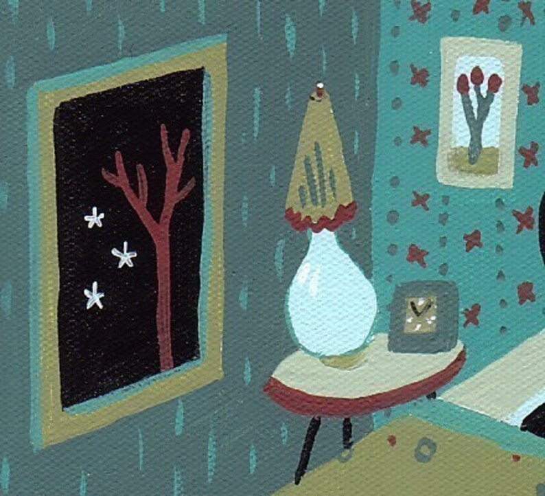 May include: A framed illustration of a red tree with white stars on a black background, a white lamp with a red and white shade, and a clock on a small table with a red and white top.