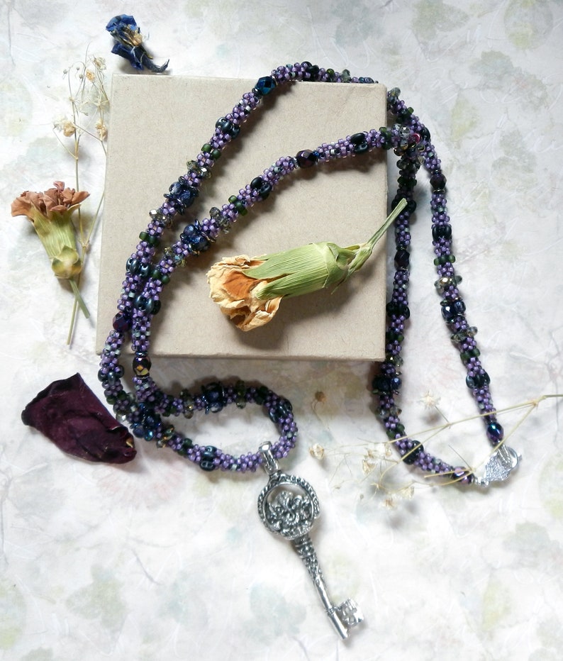 Key to Wisdom Purple Beaded Necklace