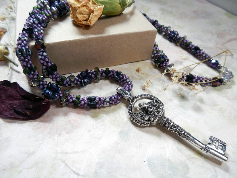 Key to Wisdom Purple Beaded Necklace