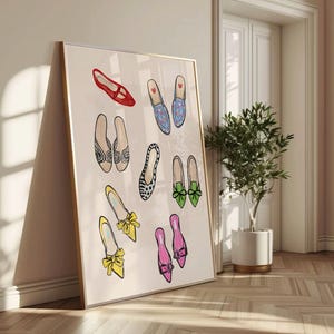 May include: A framed print of a collection of colorful and patterned shoes. The shoes are drawn in a whimsical style and include a pair of red shoes, a pair of blue shoes with white hearts, a pair of black and white shoes, a pair of green shoes, and a pair of pink shoes.