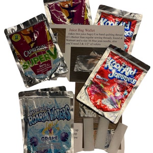 May include: Four juice pouches, two Capri Sun, one Kool-Aid Jammers, and one Capri Sun Roar'n Waters, all in silver foil packaging. The pouches are arranged on a white surface with a piece of paper with instructions for making a juice pouch wallet. The instructions include using two juice pouches, hand quilting thread, a size 16 blue jean needle, and 2 1/2 inches of velcro.