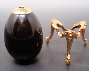 Gabon Ebony 24k Kaleidoscope Egg with Brass stand by Bryan Tyler Nelson.