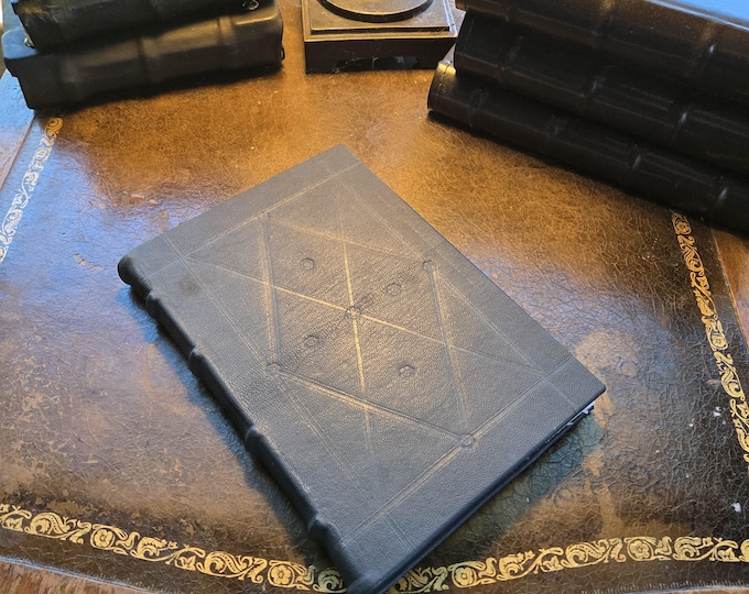 Dark blue leather journal