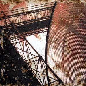May include: A close-up of a rusty metal structure with a corrugated metal panel in the background. The structure is made of steel beams and has a weathered, industrial look.