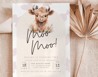 May include: A light-colored invitation card featuring a watercolor illustration of a Highland cow with floral accents. The text "Moo Moo!" is written in a whimsical font. The card also includes event details for a second birthday celebration.