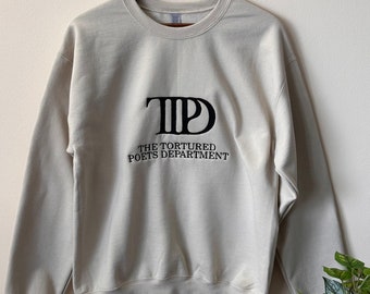 Sweatshirts brodés Taylor Swift du département des poètes de la torture, produits Swiftie Merch de haute qualité en beige noir et blanc.