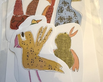 May include: A package of bird-themed stickers. The stickers feature various colorful bird illustrations with unique patterns and designs. The word "Bird" is written in black script at the top. The stickers are packaged in a clear plastic sleeve.