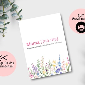 Pode incluir: Cartão imprimível com um design floral e o texto "Mama ['ma.ma] Substantiv, feminin - die Seele eines Zuhauses" em rosa. O cartão também inclui um ícone de impressora e o texto "zum Ausdrucken".
