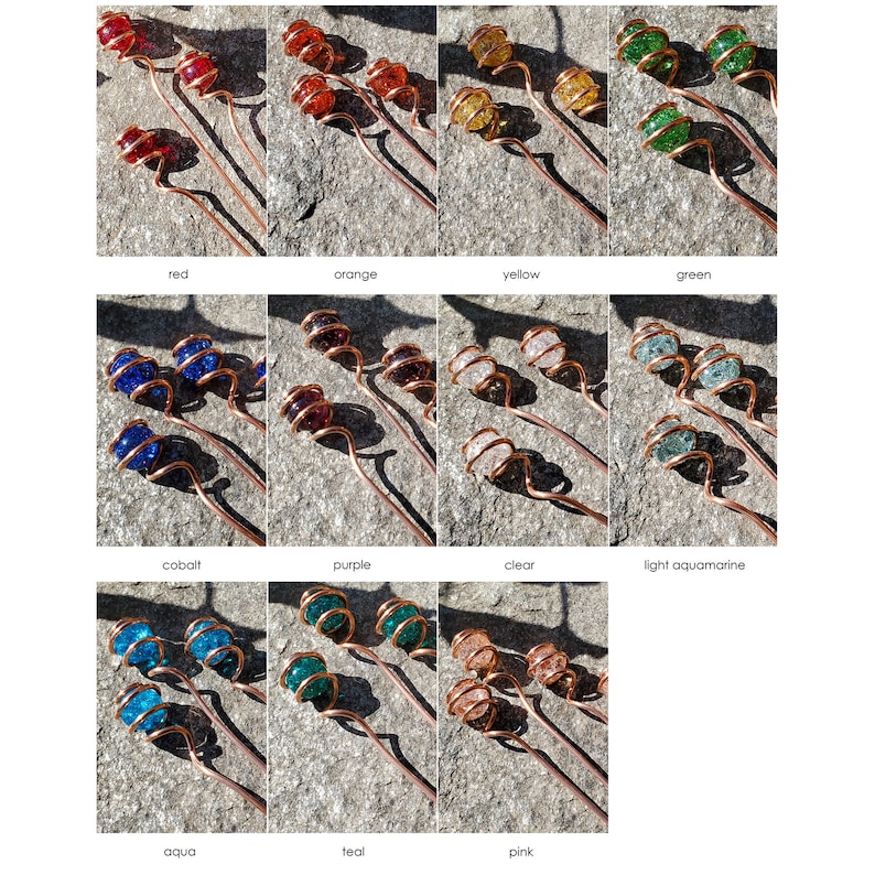 May include: A set of 10 copper wire garden stakes with glass orbs in various colors, including red, orange, yellow, green, cobalt, purple, clear, light aquamarine, aqua, teal, and pink.