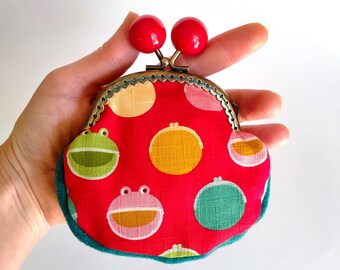 Coin purse with happy frogs, kiss lock frame with big red bobbles