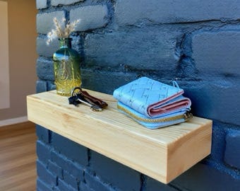 Table de chevet flottante : étagère en bois avec tiroir caché pour un rangement secret et style moderne