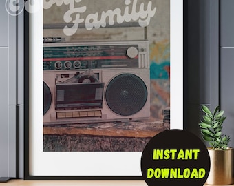 May include: A vintage boombox with a cassette tape inserted, sitting on a wooden surface with a faded, colorful background. The boombox is silver and black with a red and black display.