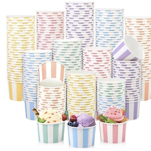 May include: Stacks of colorful paper ice cream cups in various pastel colors, including yellow, pink, blue, and purple. Some cups are filled with ice cream and toppings. The cups have striped patterns.