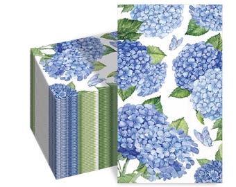 May include: A stack of paper napkins with a watercolour design of blue hydrangea flowers and butterflies on a white background. The edges of the napkins show a mix of blue and green stripes.
