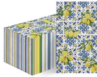 May include: Napkins with a lemon and floral design. The napkins have a repeating pattern of lemons, white flowers, and green leaves on a blue and white tile background. The side view shows vertical stripes of yellow, blue, and green.