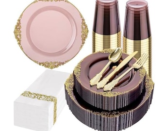 May include: A collection of disposable party supplies, including pink plates with gold trim, dark brown plates, gold cutlery, clear cups with gold bases, and white napkins with gold accents. Perfect for a wedding or special event.