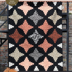 May include: A quilt pattern for a "Chromaflick Cathedral" quilt. The pattern is available as an instant download. The quilt features a black background with geometric shapes in shades of pink, orange, and gold. The quilt is shown in three sizes: baby, throw, and bed.