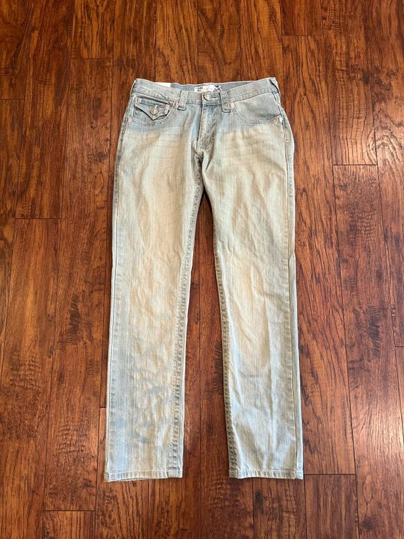 LAGUNA BEACH Jean Co. デニムパンツ Laguna Beach Jean Co. Women's Acid Wash Skull Studded Low Waist