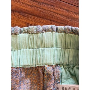Pantalones cortos Free People Solar Flare Baja a rayas verdes y azules, talla M, estilo bohemio. imagen 10
