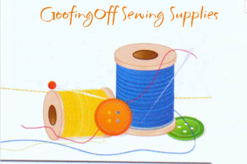 May include: Two spools of thread, one yellow and one blue, with a red pin and three buttons. The spools are on a white background with the text "CroofingOff Sewing Supplies" at the top.