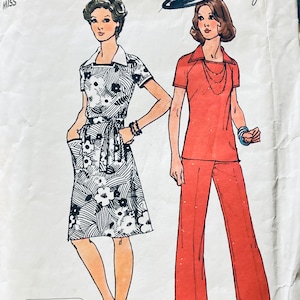 May include: A vintage Simplicity sewing pattern for a dress and pants outfit. The pattern is for size 16 and is called "Jiffy" easy cut - easy sew. The dress is black and white with a floral print and the pants are red.