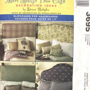 May include: A McCall's sewing pattern featuring headboard slipcovers. The image showcases four different headboard designs with various fabric patterns, including plaid, floral, and solid colors. The text reads "More Splash Than Cash" and "Decorating Ideas".