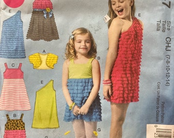 Girls' Shrug, Top, Dresses, Shorts , and Leggings Sewing Pattern...McCall’s 6547...Size 7-14 Complete