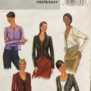 May include: A sewing pattern for five different tops, including a black and white patterned top, a red top, a black top, a white top, and a purple top. The pattern is from Butterick and is labeled B4078. The pattern is for sizes 18, 20, and 22.