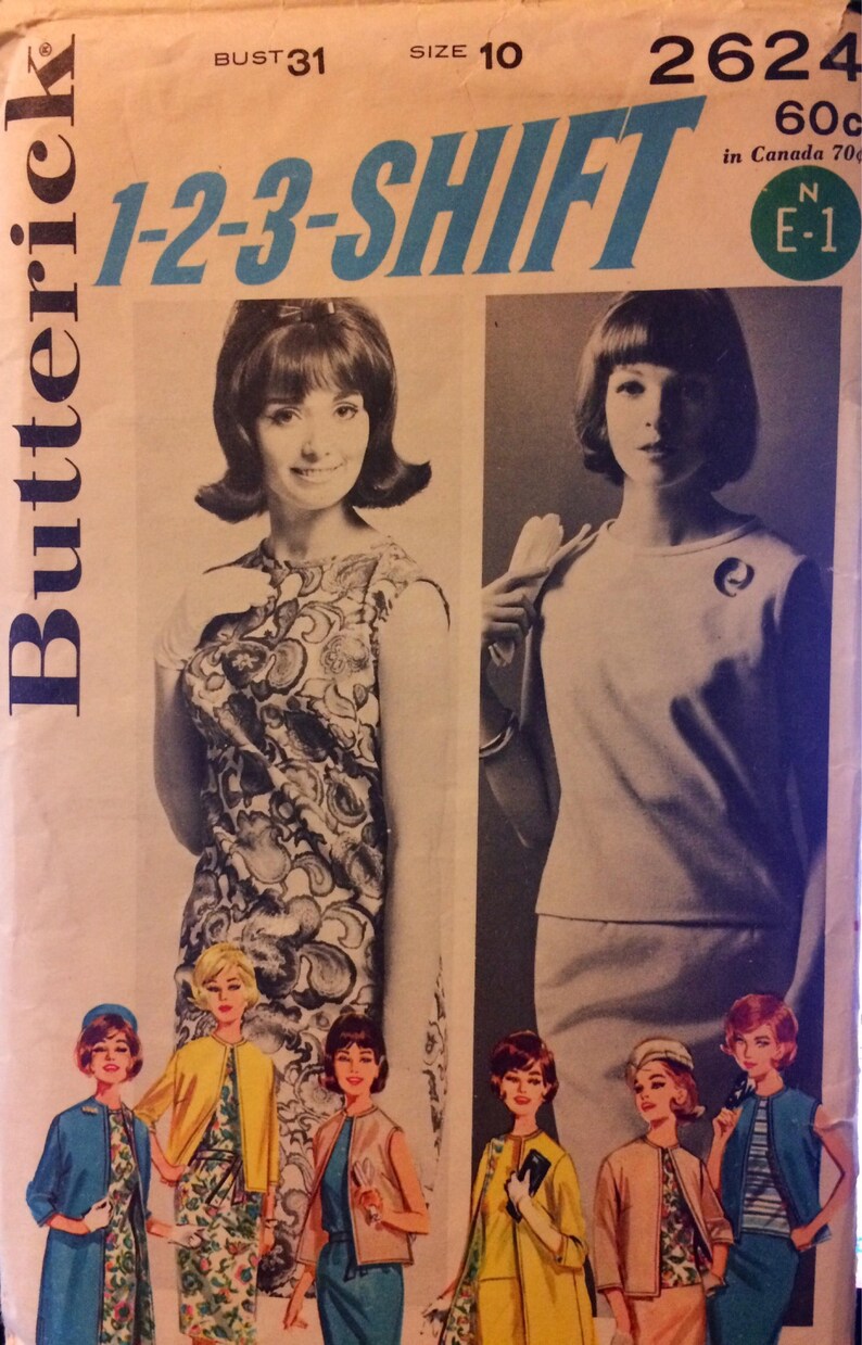 May include: A vintage sewing pattern for a dress with a 1-2-3-shift design. The pattern is from Butterick and is size 10, bust 31. The pattern features a dress with a floral print and a solid colour dress.