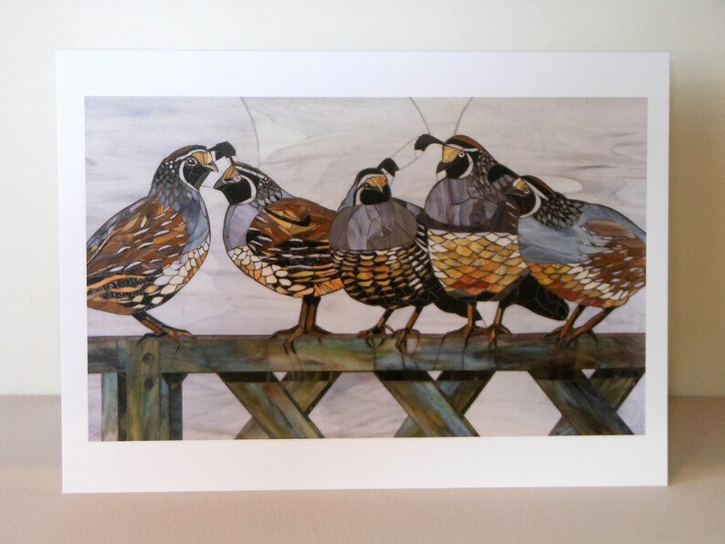 May include: A group of five brown, gray, and white quail birds perched on a wooden fence. The birds are facing different directions and have detailed markings on their feathers.