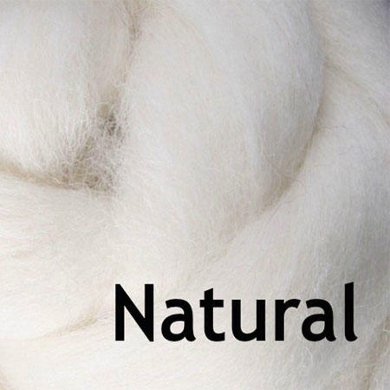 May include: Natural white wool roving, a soft and fluffy fiber used for spinning, felting, and other crafts.