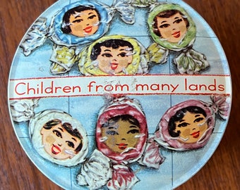 vintage   tin great for sewing crafts teas herbs 3 inches by 4 inches children from many lands  England