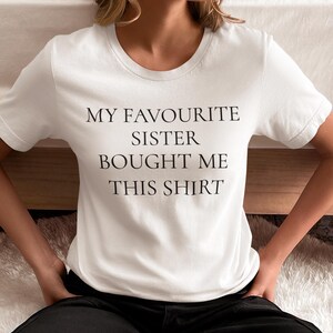Funny My Favorite Sister Bought Me This Unisex Softstyle T-Shirt | Fathers Day Gift, Brother Birthday Tee, Humor Shirt for Men