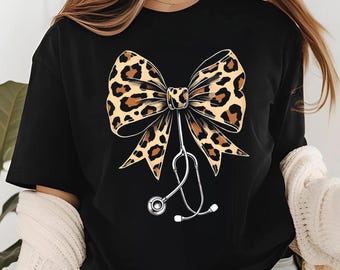 Coquette Nurse Shirt, Leopard Print Stethoscope Bow T-Shirt and Sweatshirt, Gift for Nurse, Nurse Graduation, Healthcare Professionals Shirt