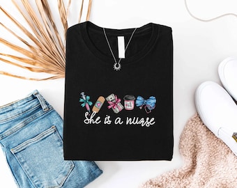 She Is a Nurse Shirt, Cute Nursing Graphic Tee, RN Graduation Gift, Healthcare Worker Sweatshirt, Nurse Appreciation, Medical Student Gift