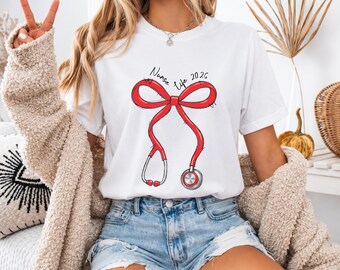 Nurse Life 2026 Shirt, Red Bow Stethoscope Sweatshirt, Cute Nursing Graphic Tee, Coquette Nurse Outfit, Nursing School Gift, Nurse Gift